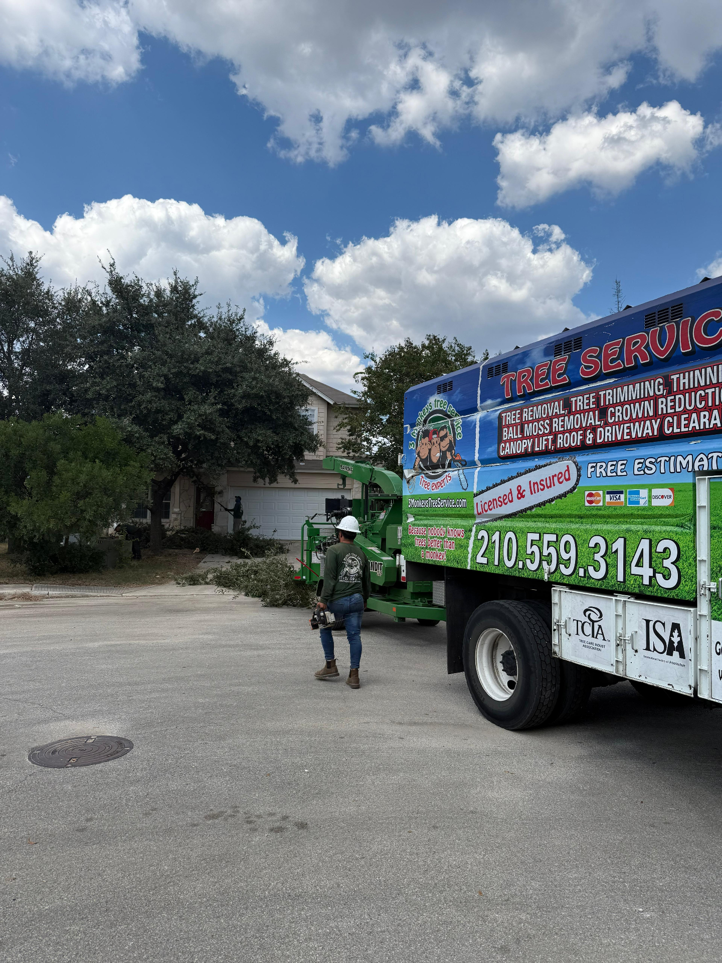 3 Monkeys crew and equipment during brush removal in San Antonio